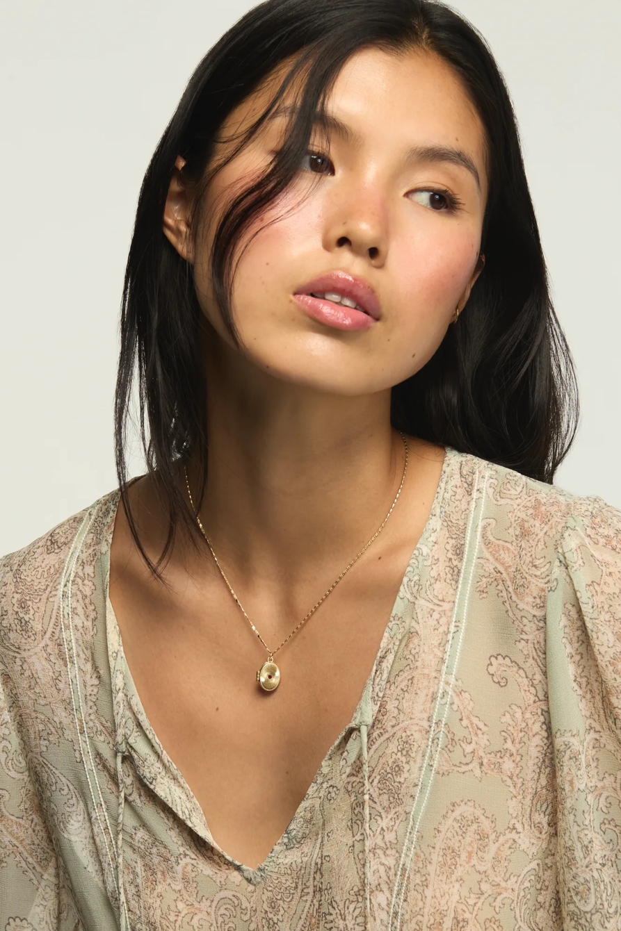 FLOWER LOCKET NECKLACE — GOLD — image 1